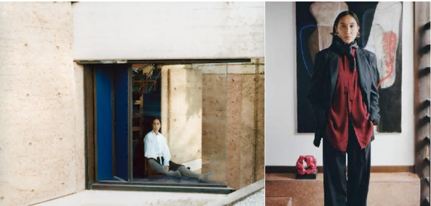 interior space featuring a person seated in a window and another person standing in a room with art