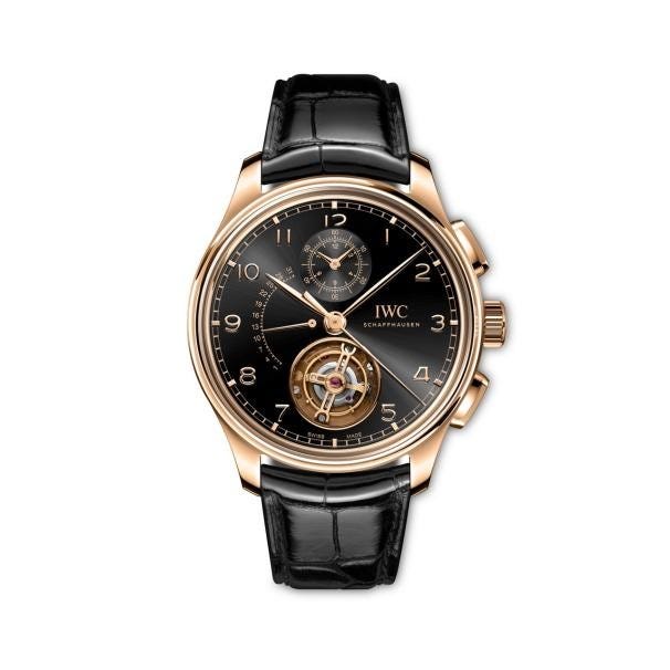 luxury chronograph watch with a black dial and gold accents