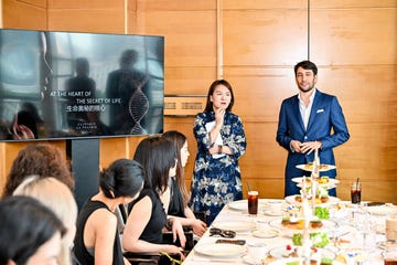 group presentation at a dining table with refreshments