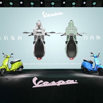 a screen with a group of toy motorcycles and a robot