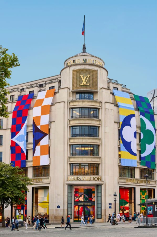a building with flags on the front