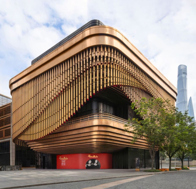 modern architectural structure with a unique design featuring curved and layered elements