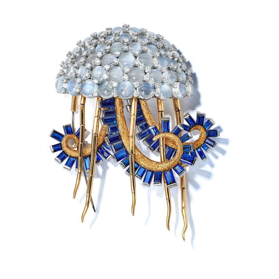 jellyfishshaped brooch featuring various gemstones
