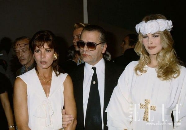 Fashion, Eyewear, Event, Fashion design, Uniform, Glasses, Haute couture, Fashion accessory, Vision care, Headpiece, 