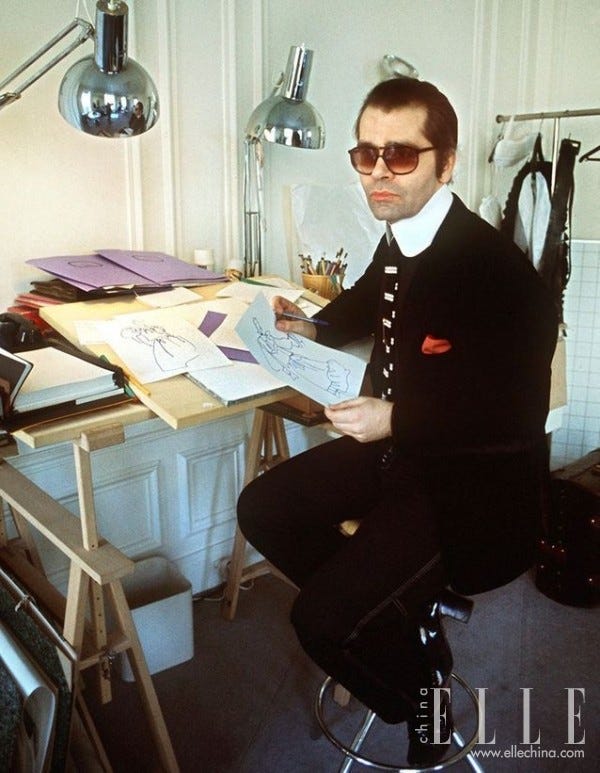 Eyewear, Glasses, Vision care, Furniture, Photography, Chair, Job, White-collar worker, Fashion design, Sitting, 
