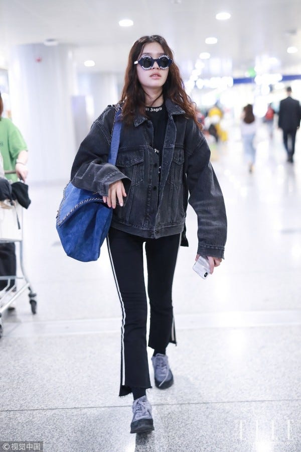 Clothing, Fashion, Street fashion, Snapshot, Shoulder, Jeans, Outerwear, Eyewear, Fashion model, Footwear, 