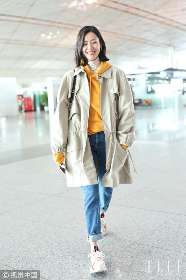 Clothing, Street fashion, White, Photograph, Outerwear, Fashion, Coat, Snapshot, Yellow, Trench coat, 