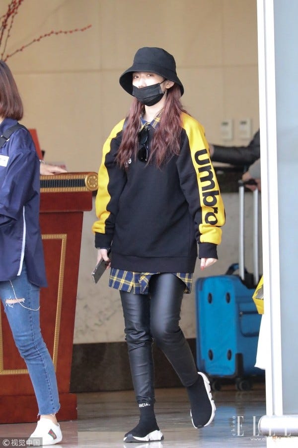 Clothing, Street fashion, Yellow, Jeans, Fashion, Footwear, Snapshot, Denim, Outerwear, Headgear, 