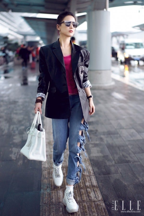 Clothing, Street fashion, Photograph, Fashion, Snapshot, Outerwear, Jeans, Shoulder, Footwear, Blazer, 