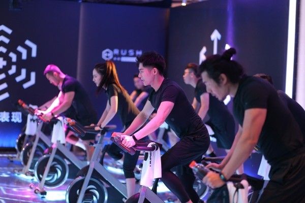 Indoor cycling, Performance, Exercise, Sports, Event, Vehicle, Recreation, Cycling, Bicycle, Performing arts, 