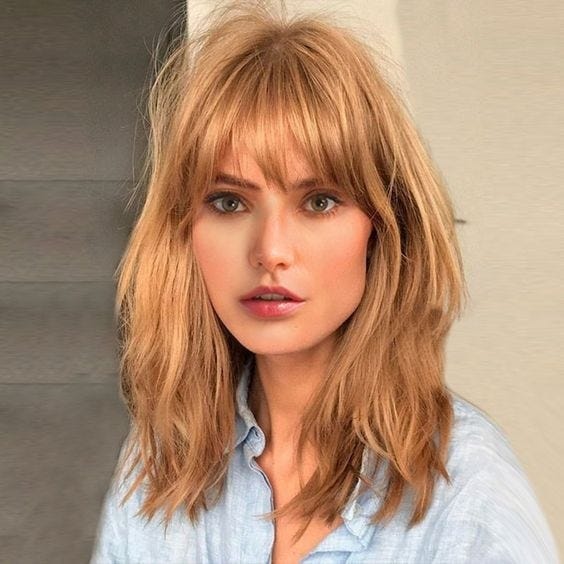 Hair, Face, Hairstyle, Blond, Eyebrow, Layered hair, Bangs, Hair coloring, Chin, Brown hair, 